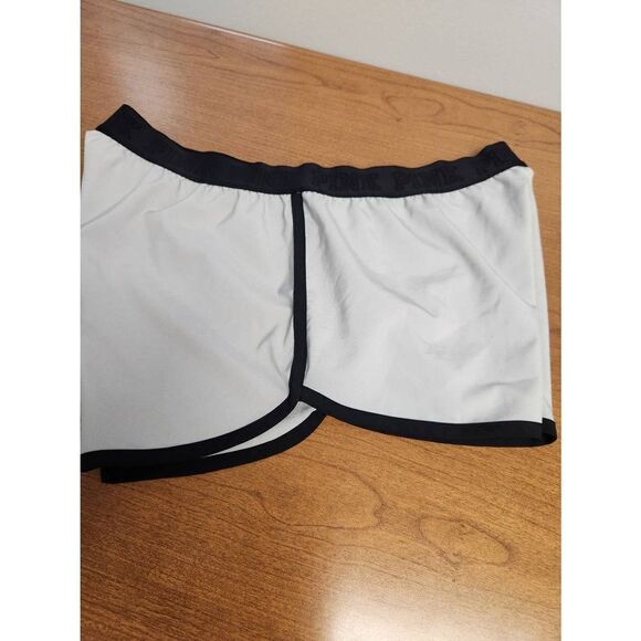 Pink LARGE grey shorts with black trim and PINK made out of Zebra font in yellow - Picture 5 of 7